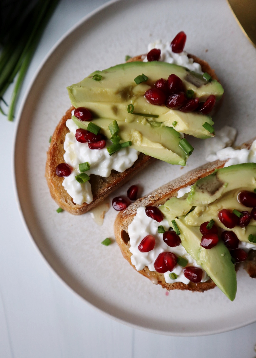 Avocado and Cottage Cheese Toast with Pomegranate and Honey